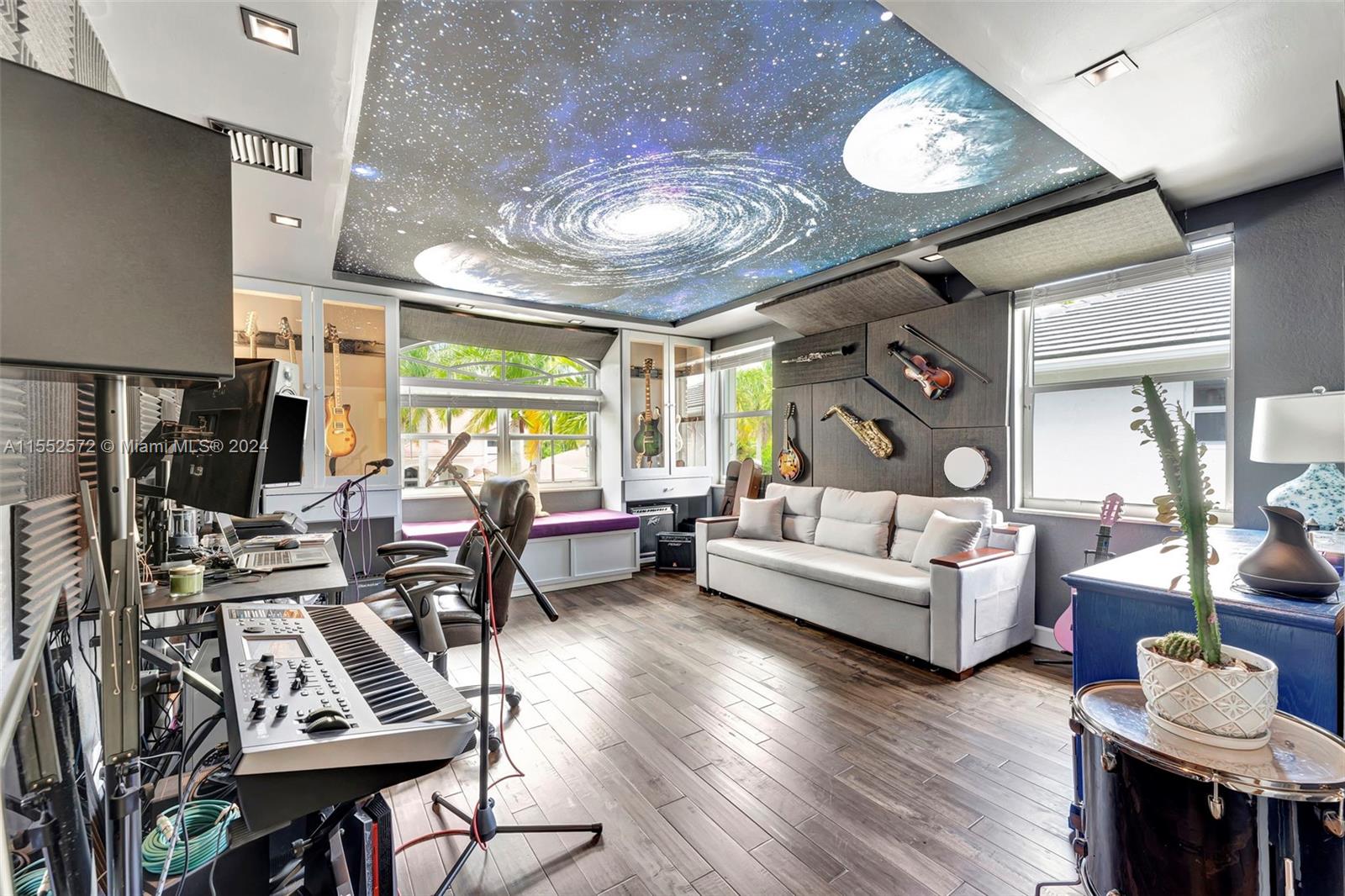 809 Regal Cove Road Weston, FL 33327 - Photo 20 of 70 a living room with furniture and wooden floor