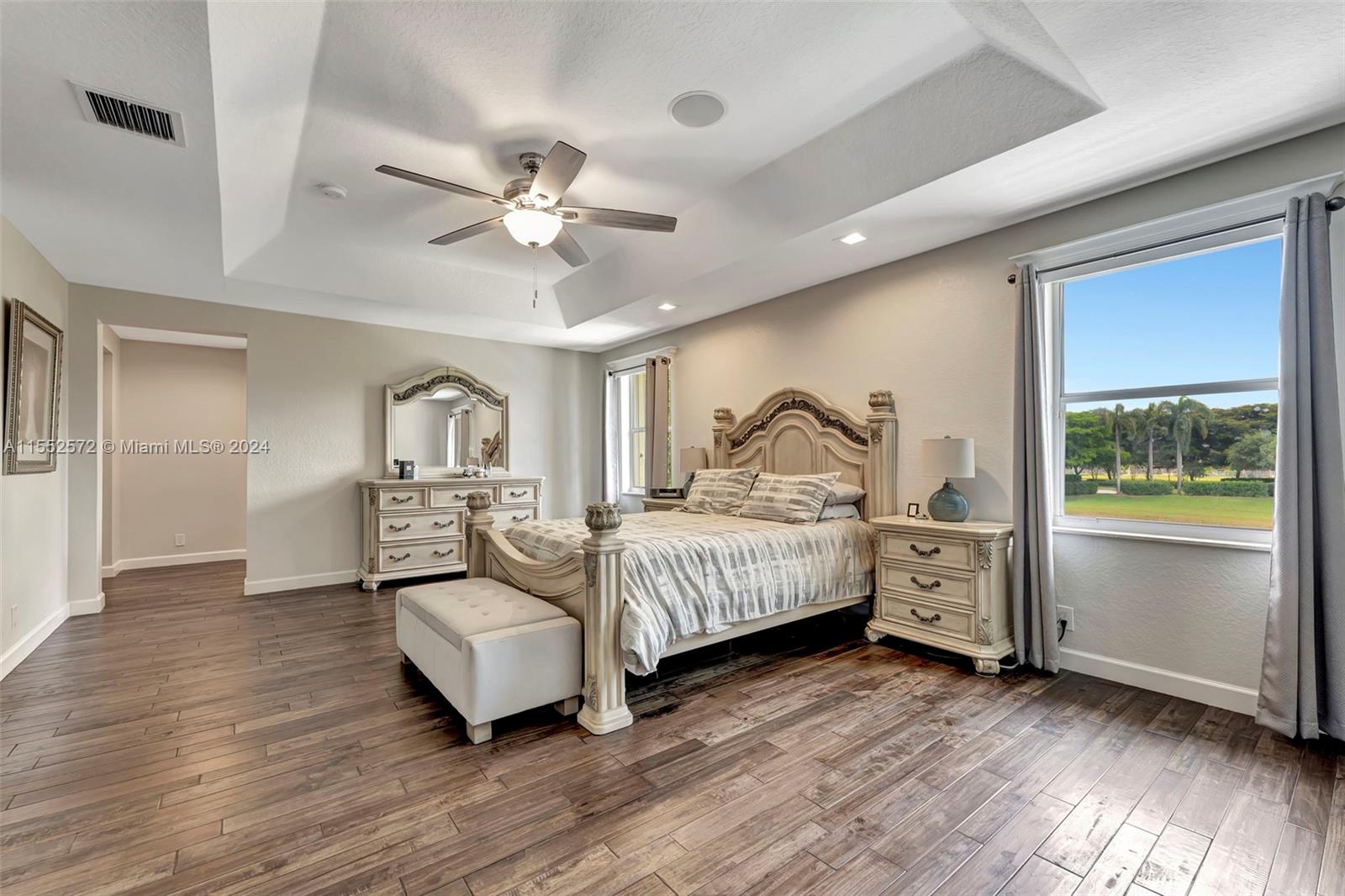 809 Regal Cove Road Weston, FL 33327 - Photo 30 of 70 a bedroom with furniture and a window