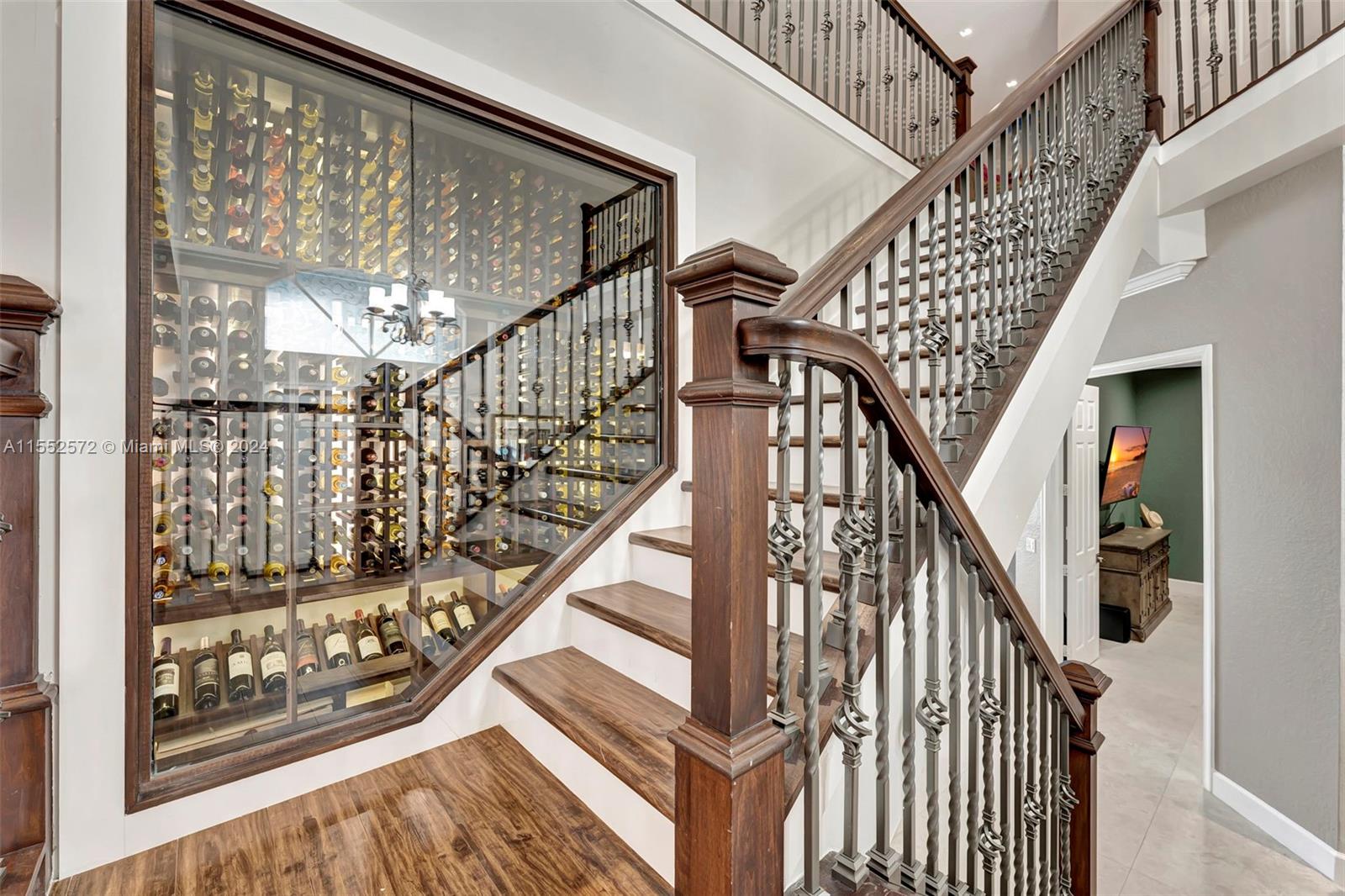 809 Regal Cove Road Weston, FL 33327 - Photo 45 of 70 a view of entryway with wooden floor and stairs