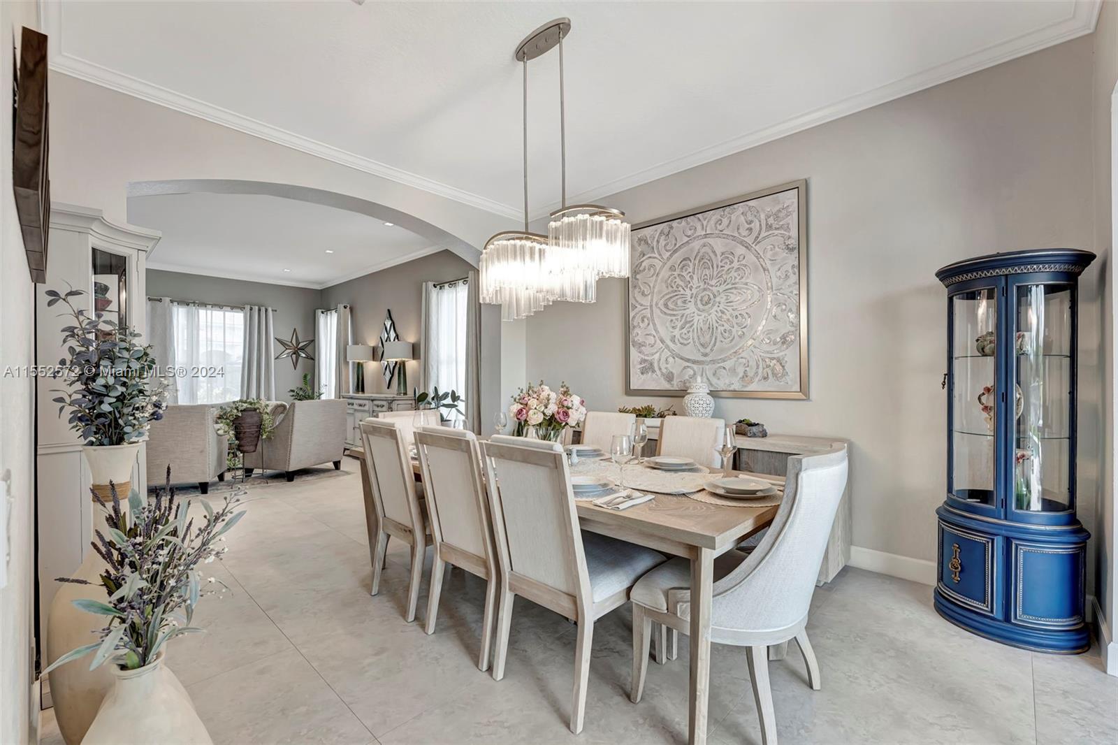 809 Regal Cove Road Weston, FL 33327 - Photo 51 of 70 a view of a dining room with furniture window and wooden floor
