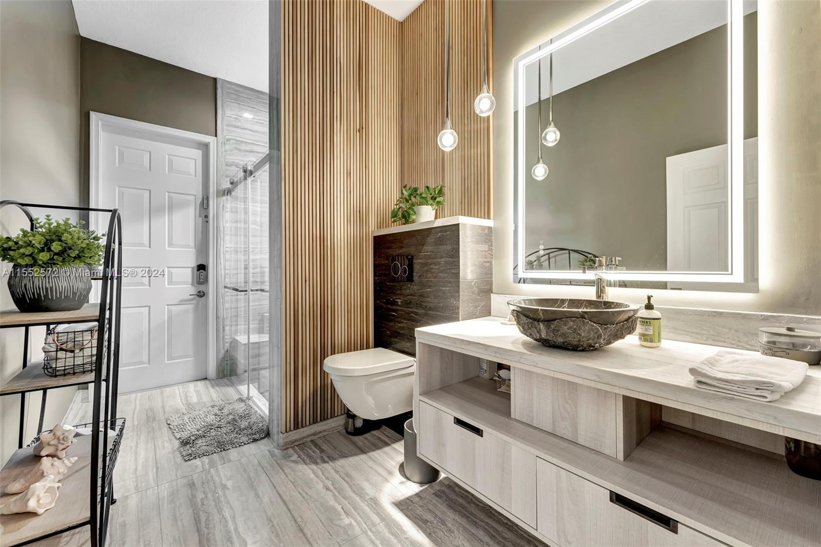 809 Regal Cove Road Weston, FL 33327 - Photo 64 of 70 a bathroom with a sink a toilet and shower