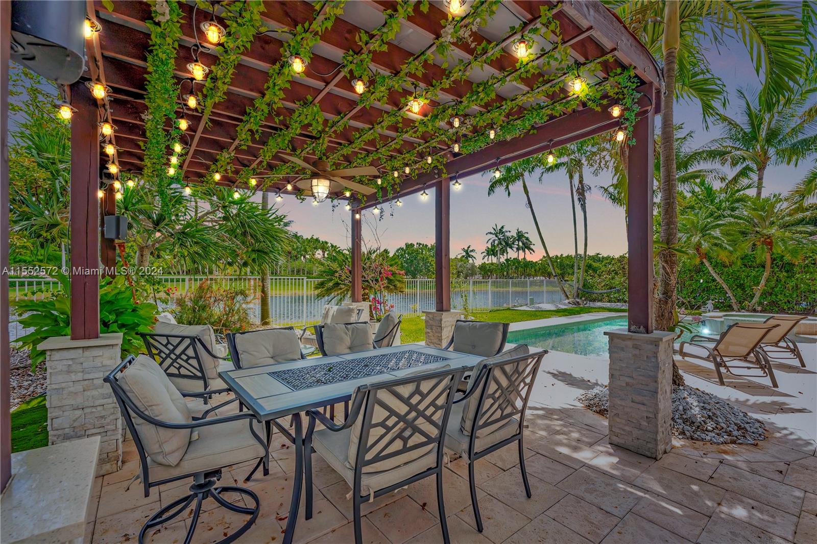 809 Regal Cove Road Weston, FL 33327 - Photo 69 of 70 a view of patio with furniture and garden
