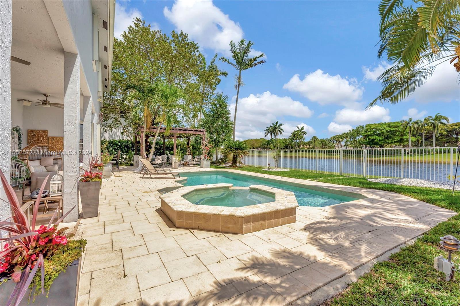 809 Regal Cove Road Weston, FL 33327 - Photo 8 of 70 a view of a backyard