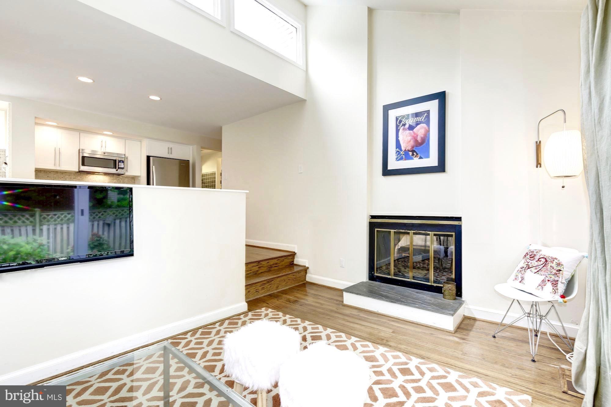 5301 Wakefield Road Bethesda, MD 20816 - Photo 11 of 28 Family Room with dual gas fireplace