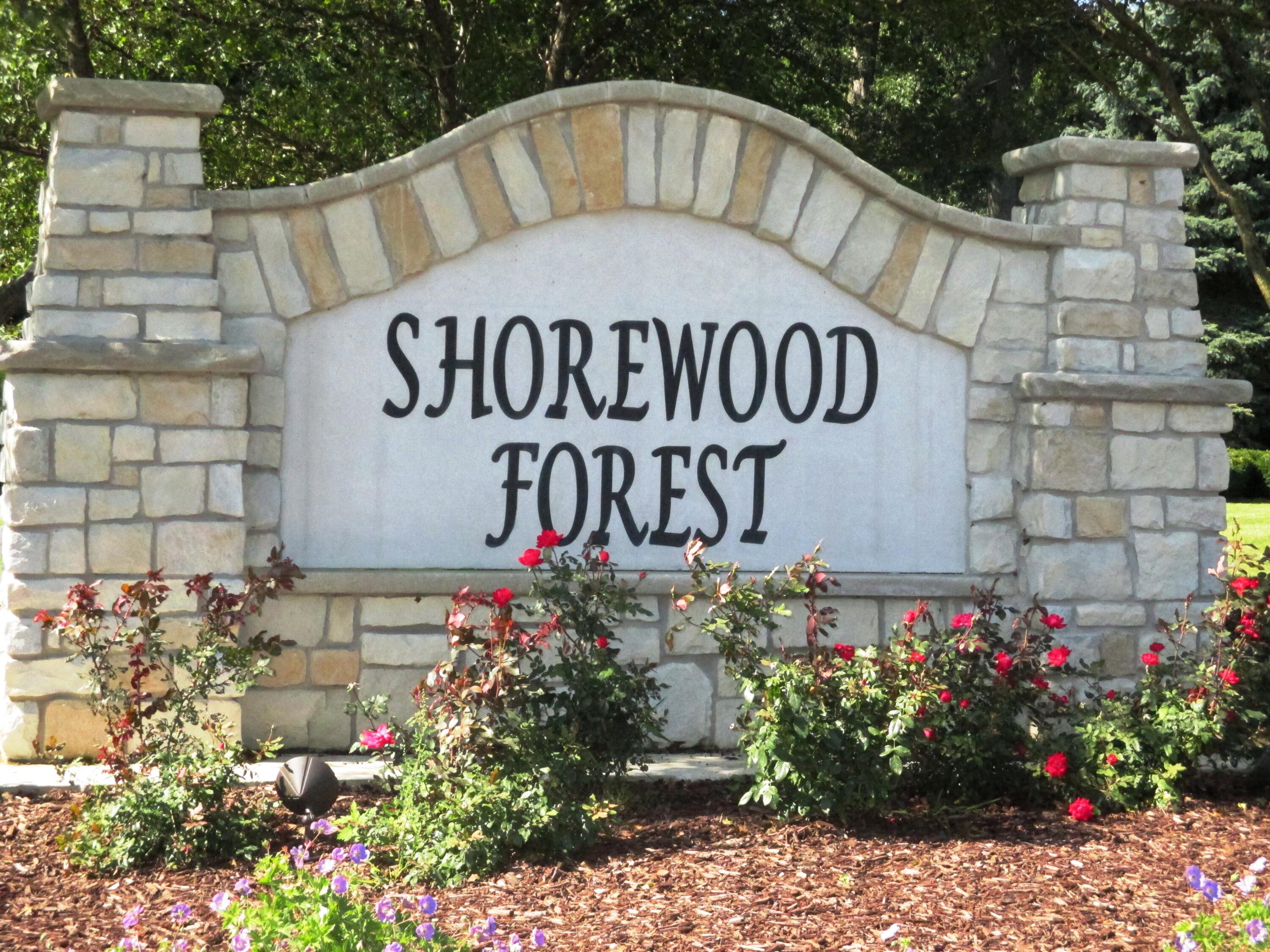 464 Roxbury Road Valparaiso, IN 46385 - Photo 5 of 12 a view of sign board with buildings and plants