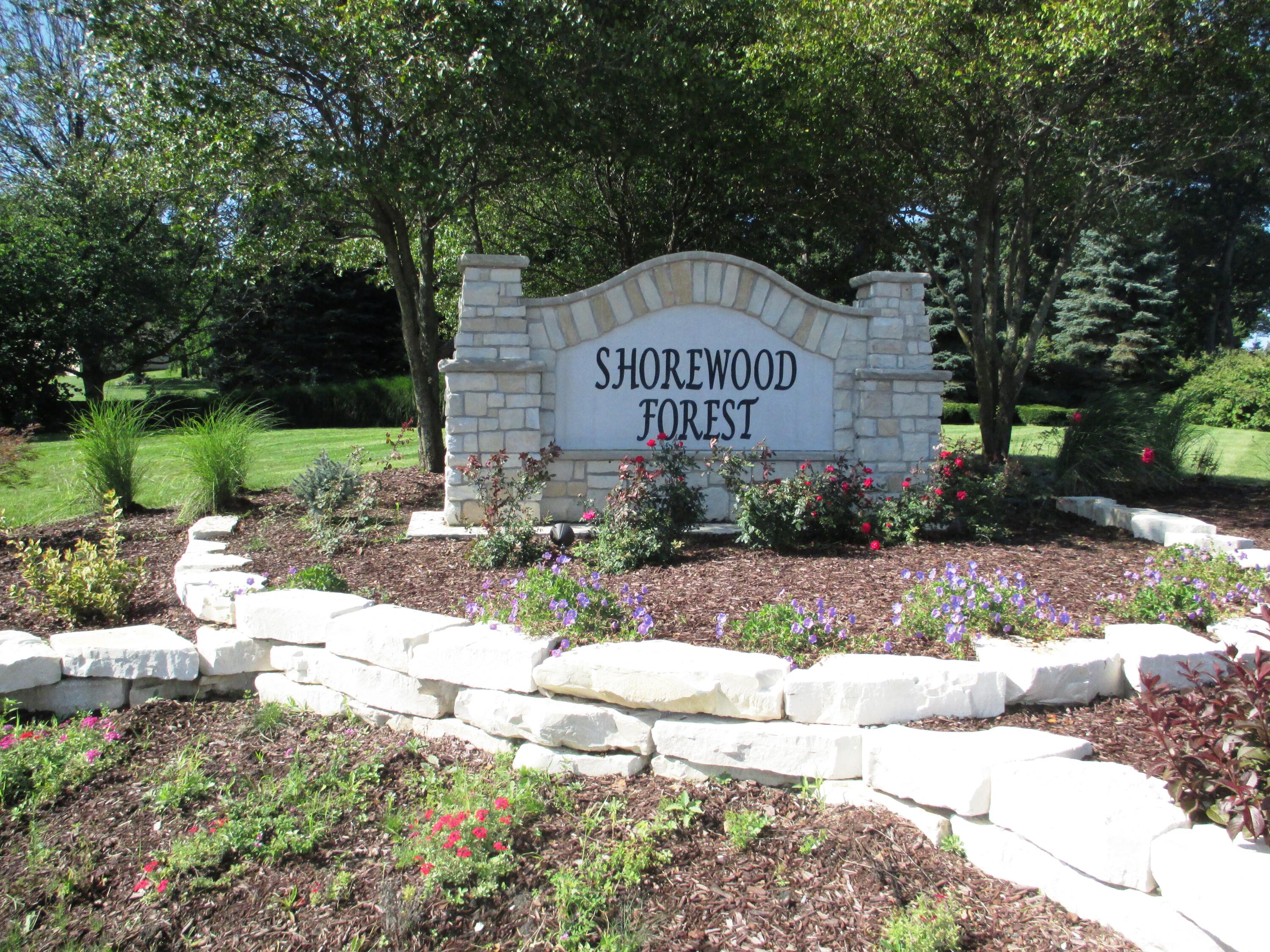 464 Roxbury Road Valparaiso, IN 46385 - Photo 6 of 12 a sign on the side of a road