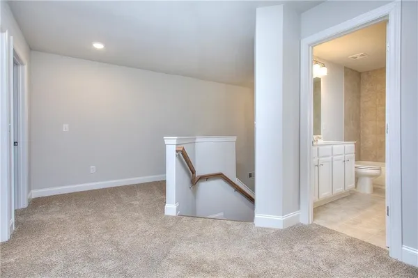 a view of an empty room and a gallery