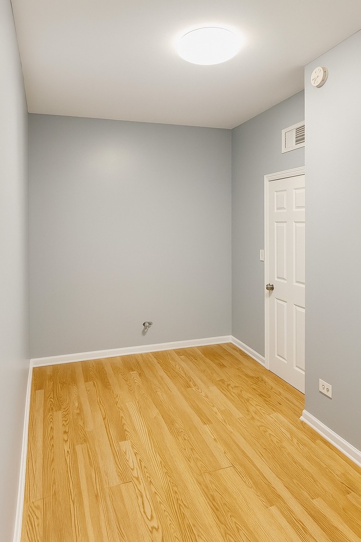 5412 South Damen Avenue, Unit 1 Chicago, IL 60609 - Photo 7 of 9 a view of empty room