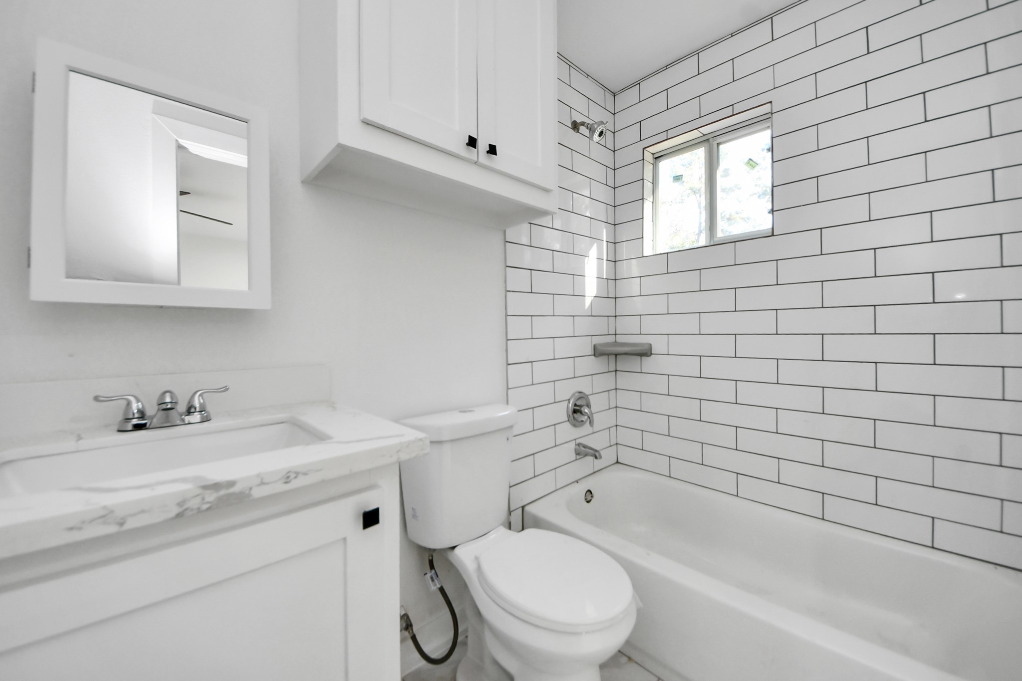 27090 Diamond C Splendora, TX 77372 - Photo 13 of 20 a bathroom with a sink a toilet and bathtub