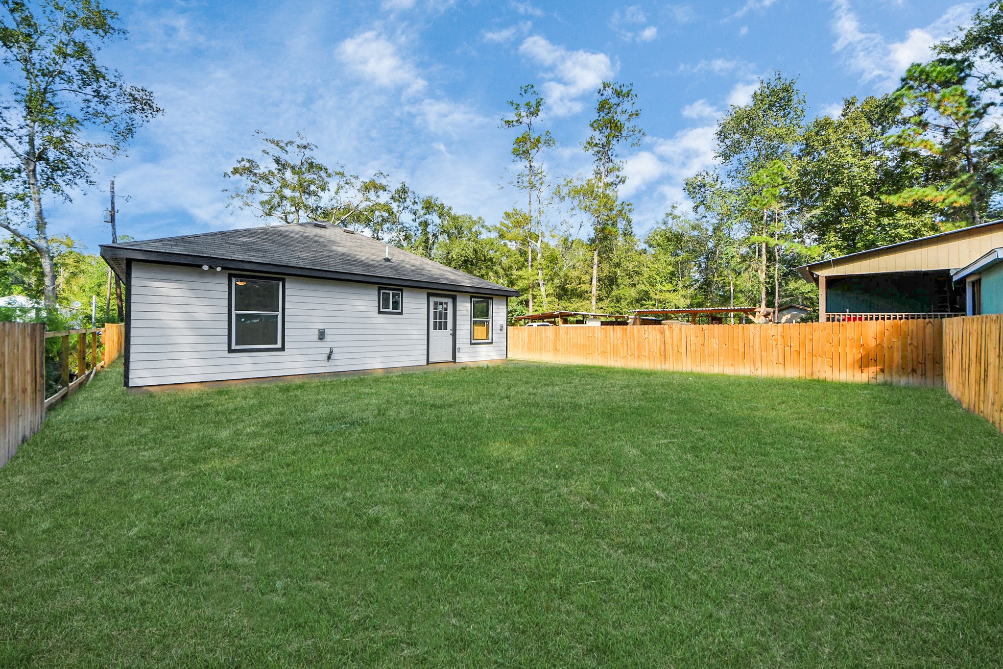 27090 Diamond C Splendora, TX 77372 - Photo 17 of 20 a front view of a house with a yard