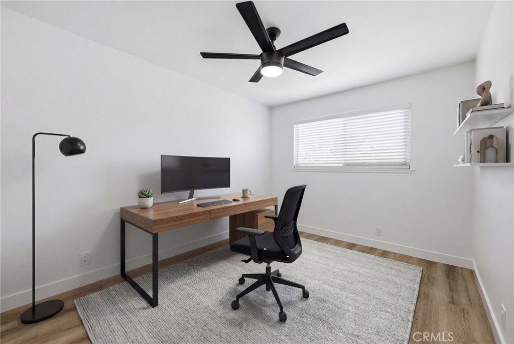 1722 Mitchell, Unit 152 Tustin, CA 92780 - Photo 12 of 25 a workspace with furniture and a window