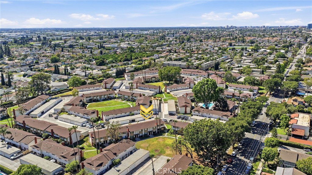 1722 Mitchell, Unit 152 Tustin, CA 92780 - Photo 24 of 25 an aerial view of a city with lots of residential buildings