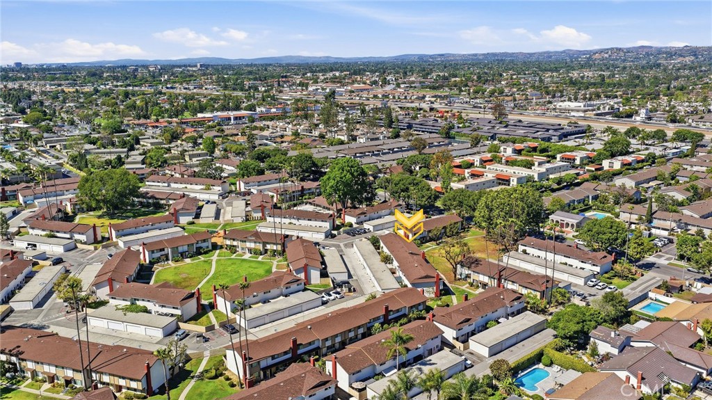 1722 Mitchell, Unit 152 Tustin, CA 92780 - Photo 25 of 25 an aerial view of a city with lots of residential buildings