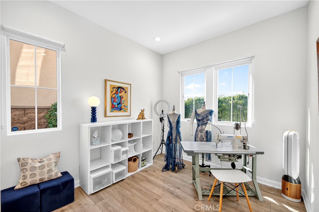 20851 Acorn Circle Porter Ranch, CA 91326 - Photo 11 of 26 a living room with furniture and a window