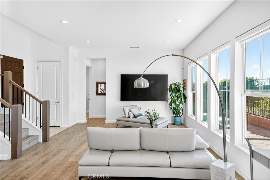 20851 Acorn Circle Porter Ranch, CA 91326 - Photo 5 of 26 a living room with furniture and a flat screen tv