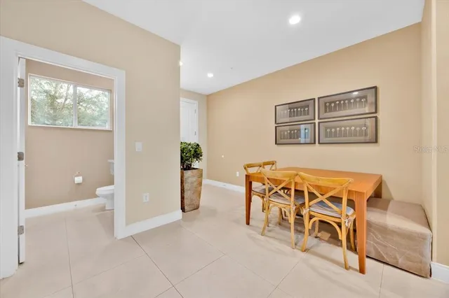 a view of a livingroom with furniture and windows