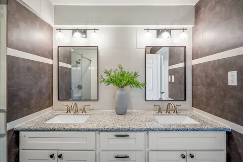 a bathroom with a shower and a toilet