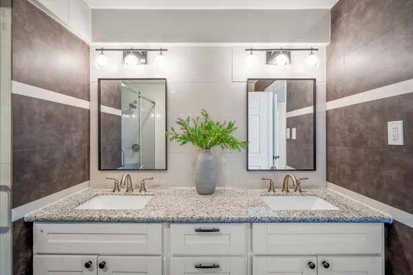 a bathroom with a shower and a toilet