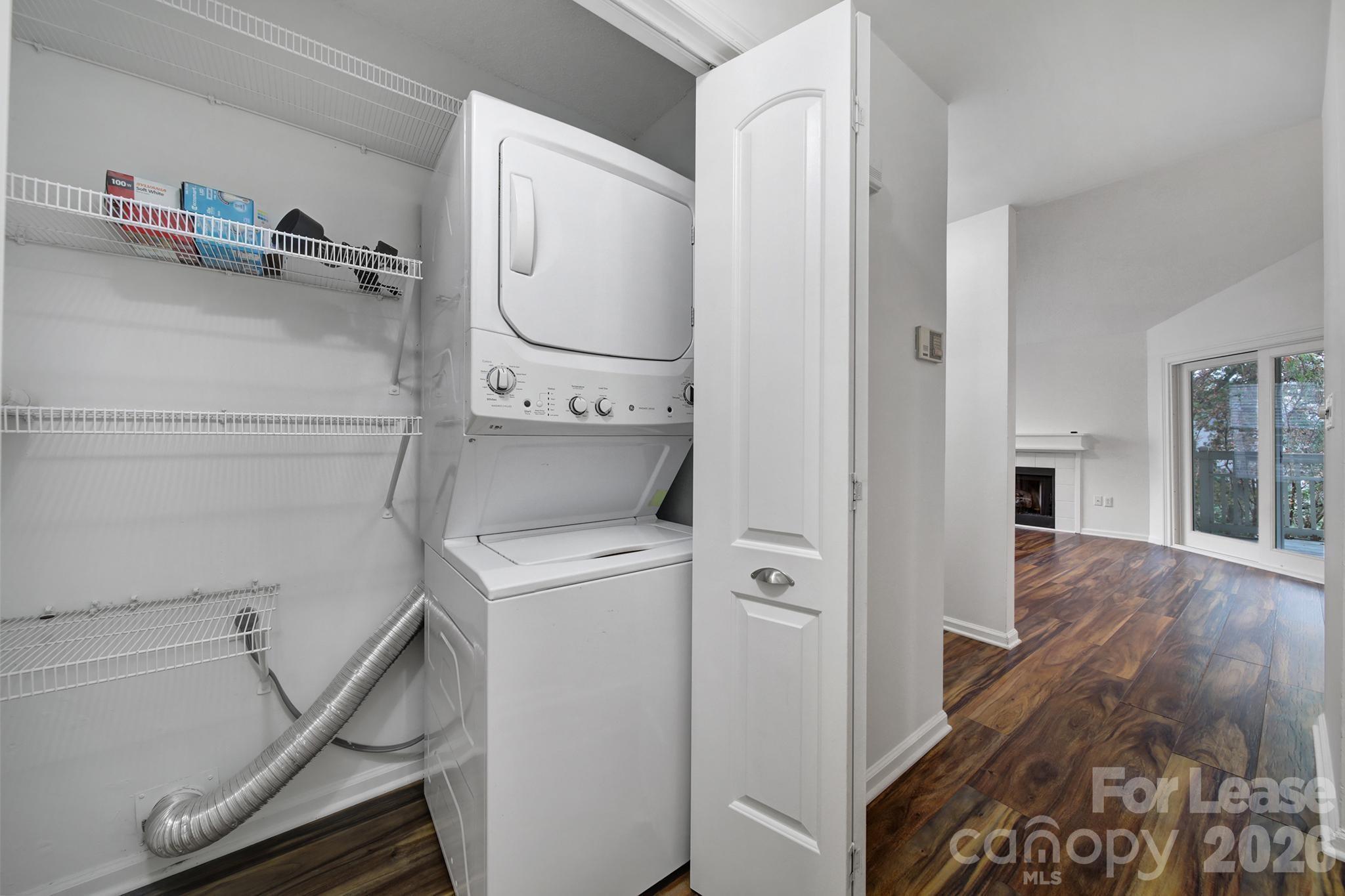 5007 Sharon Road, Unit E Charlotte, NC 28210 - Photo 12 of 24 a room with a washer and dryer