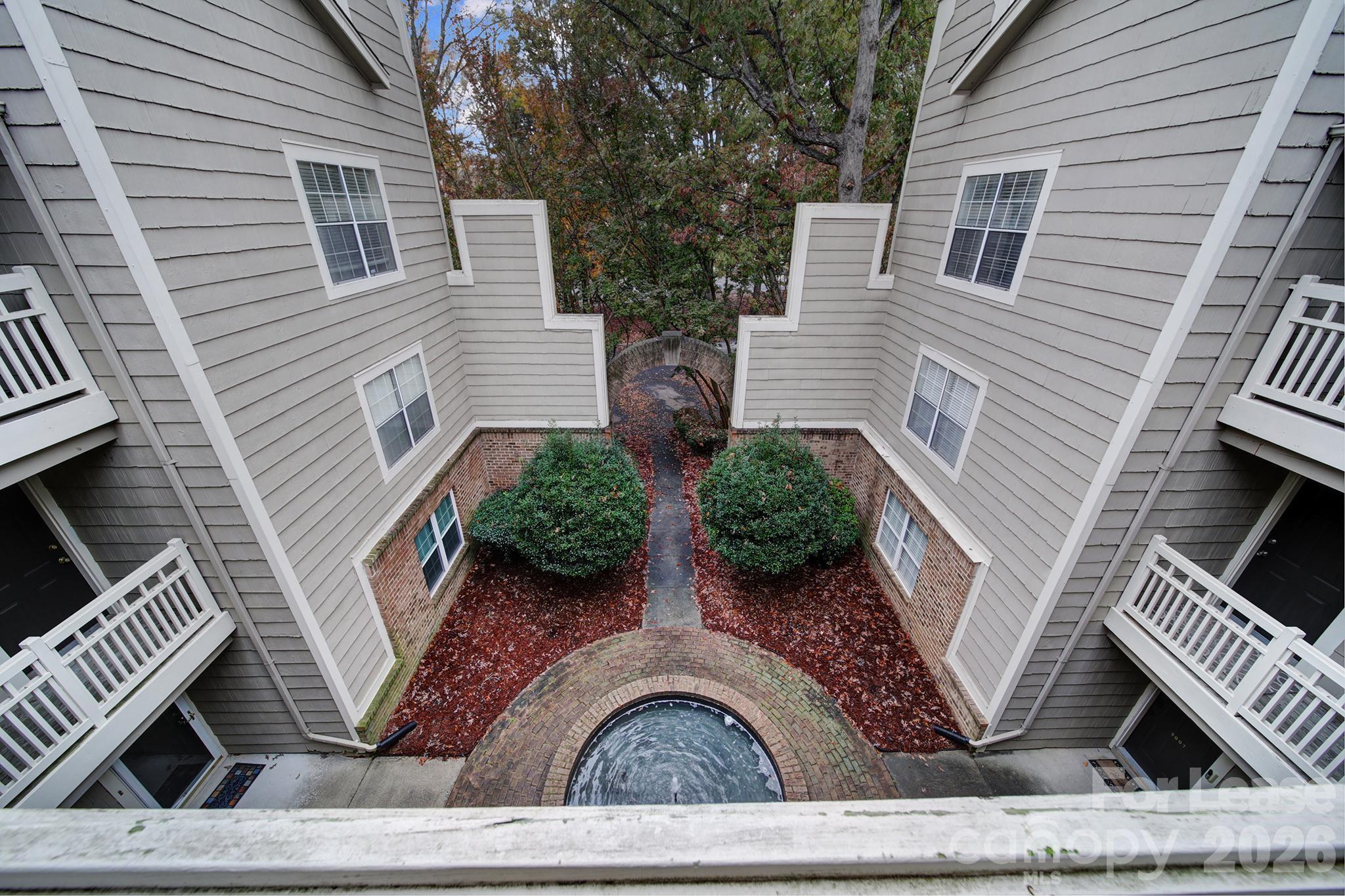 5007 Sharon Road, Unit E Charlotte, NC 28210 - Photo 22 of 24 a view of front of house