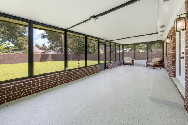 a view of hallway with a large window