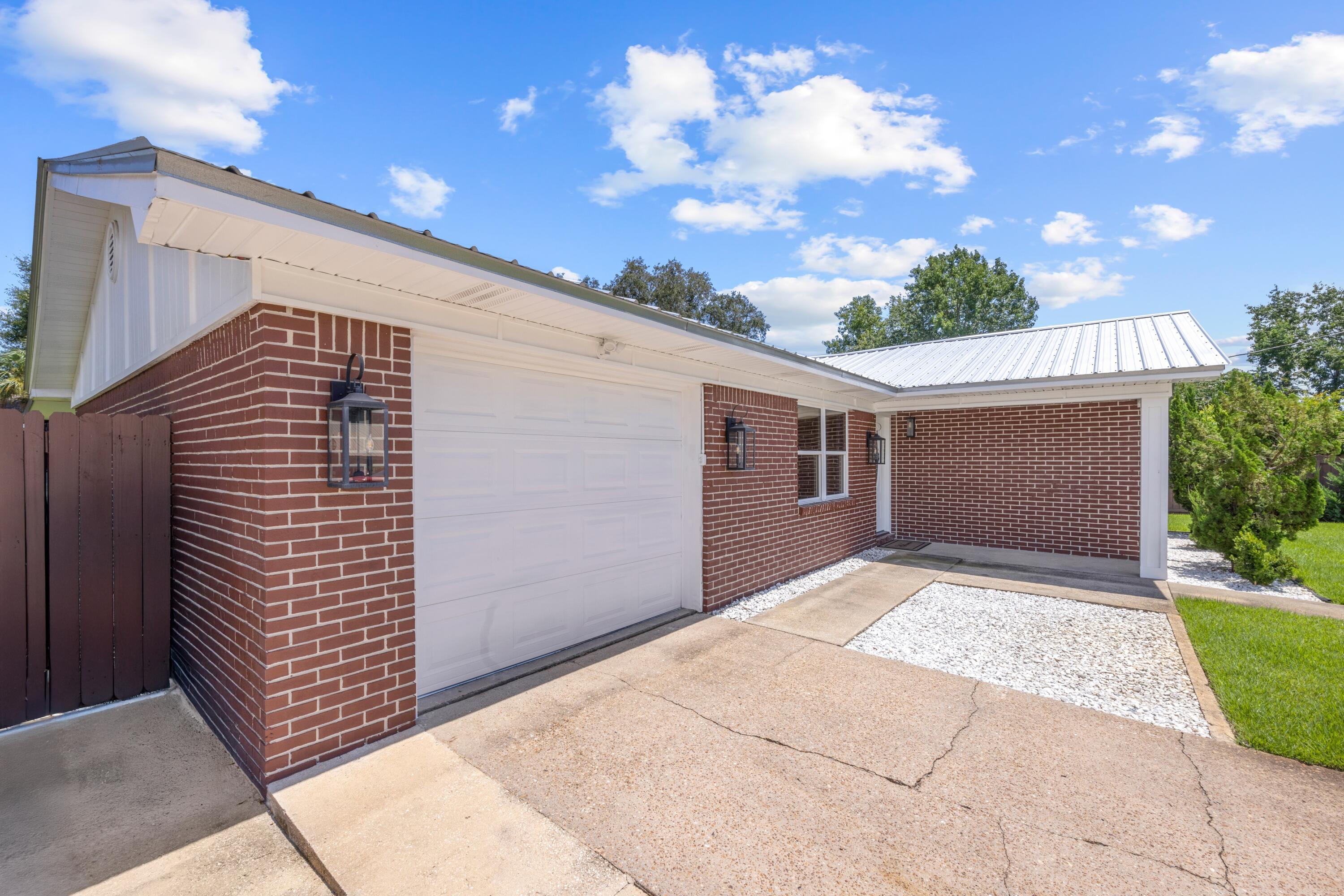 308 Spring Lane Destin, FL 32541 - Photo 3 of 47 a view of backyard of house