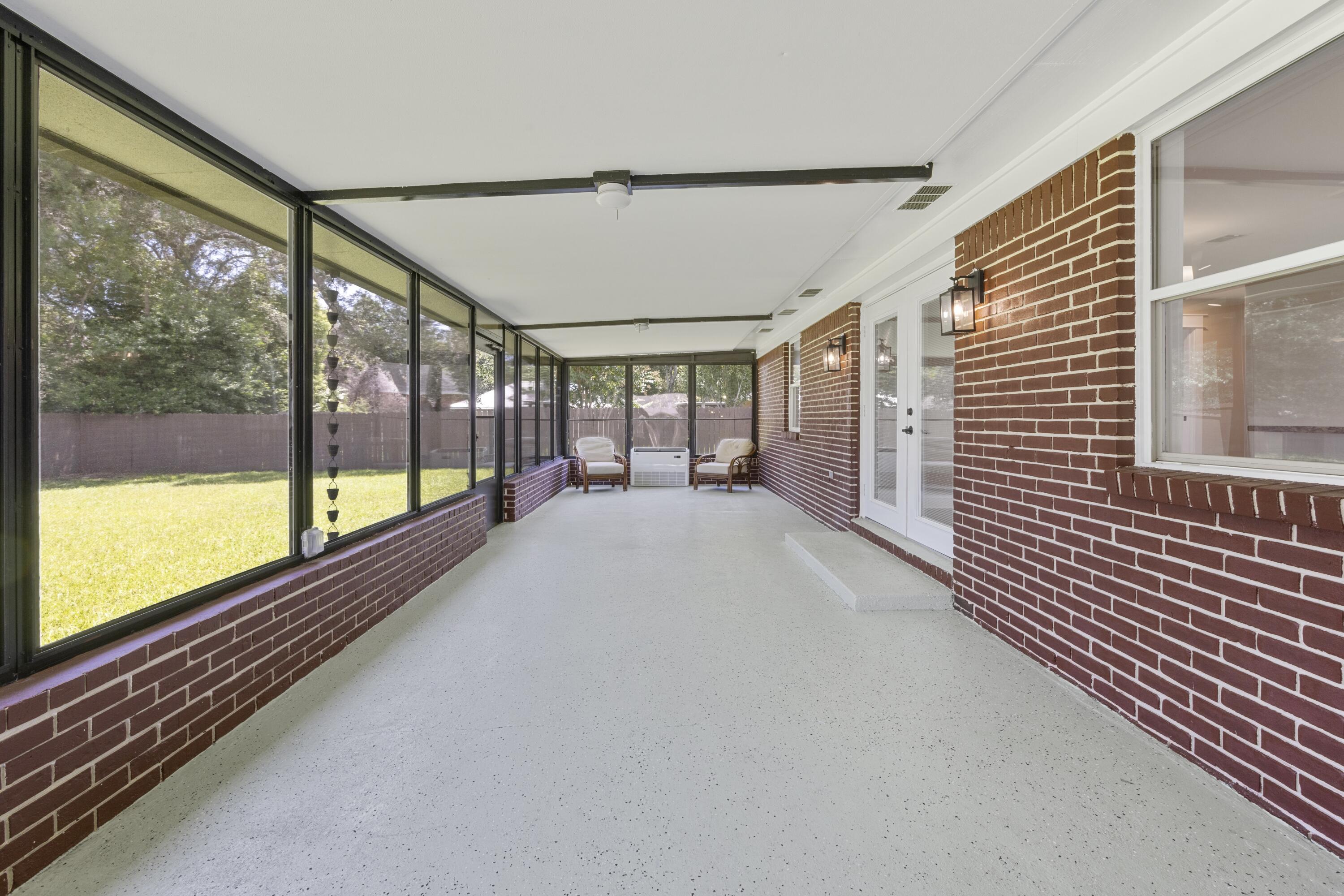 308 Spring Lane Destin, FL 32541 - Photo 31 of 47 a view of hallway with a large window