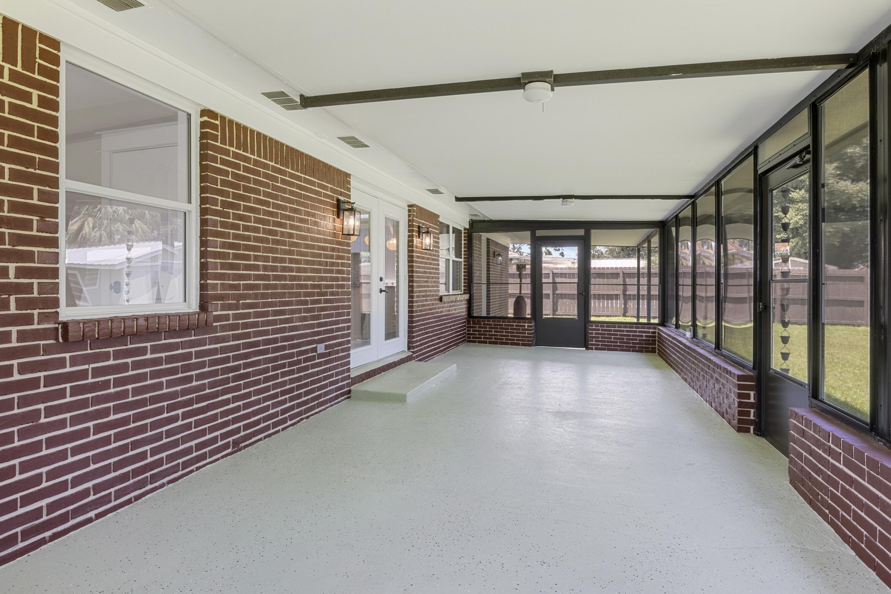 308 Spring Lane Destin, FL 32541 - Photo 33 of 47 a view of an empty room with a window