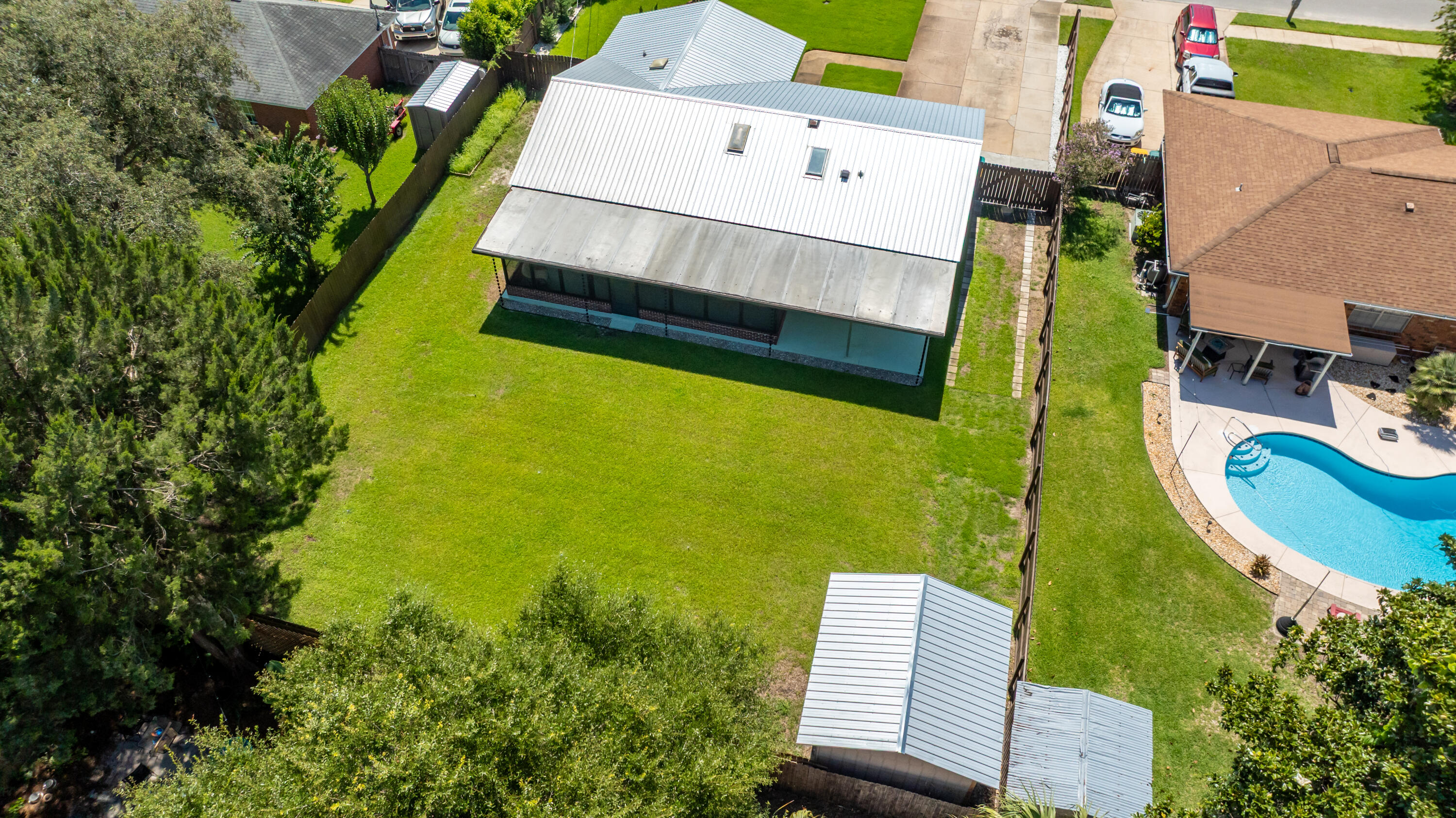 308 Spring Lane Destin, FL 32541 - Photo 43 of 47 an aerial view of a house with a garden and swimming pool