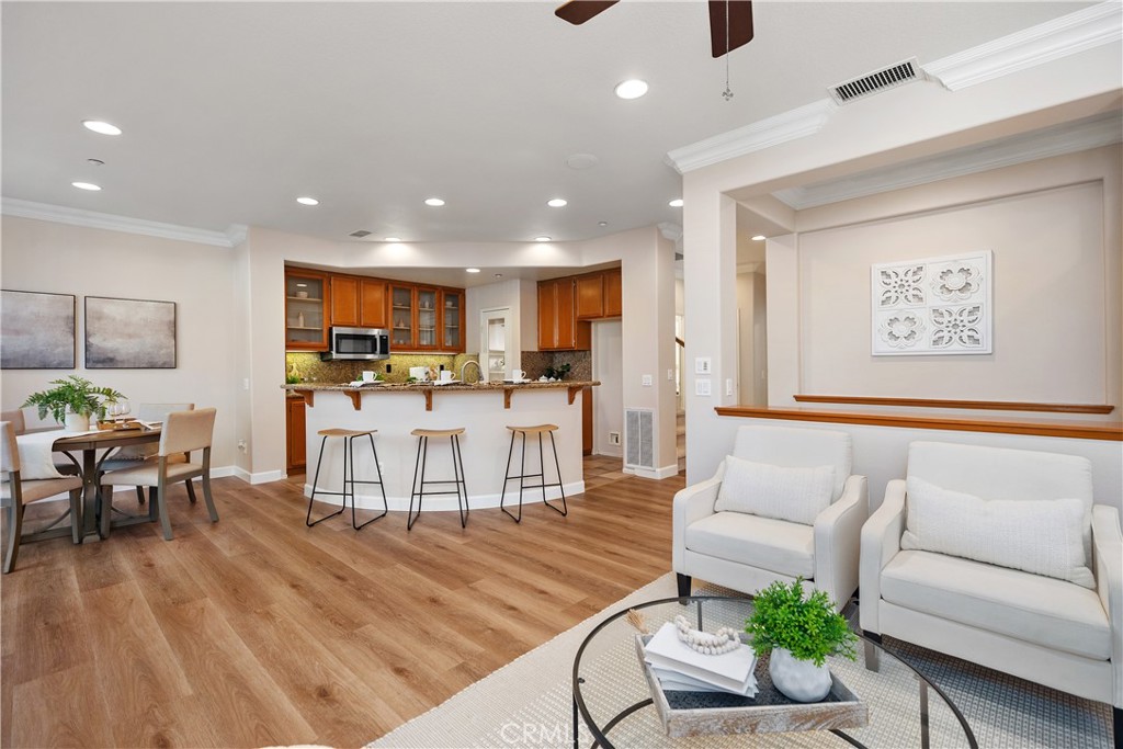 9 Lilac Irvine, CA 92618 - Photo 3 of 49 a living room with furniture and kitchen view
