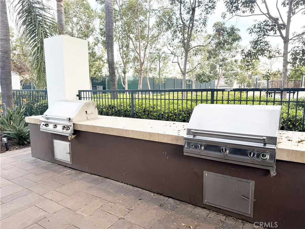 9 Lilac Irvine, CA 92618 - Photo 46 of 49 a view of a terrace with a bench