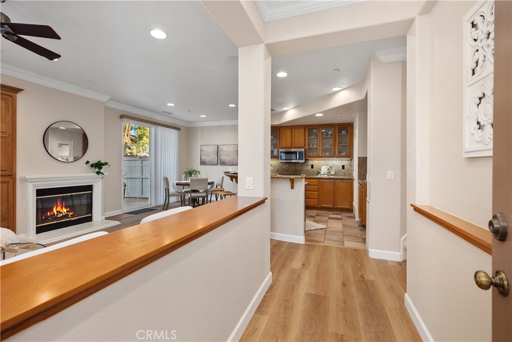 9 Lilac Irvine, CA 92618 - Photo 5 of 49 a large kitchen with cabinets table and chairs