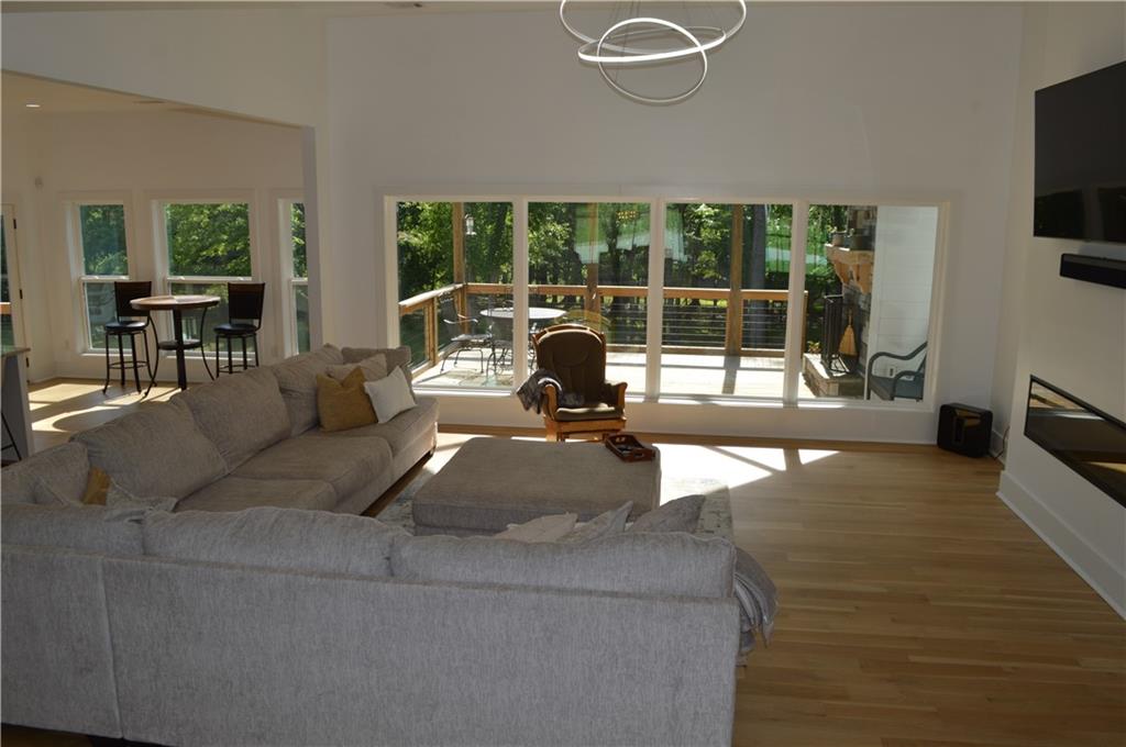 8 Ripplewood Trail Euharlee, GA 30145 - Photo 14 of 90 a living room with furniture and a flat screen tv