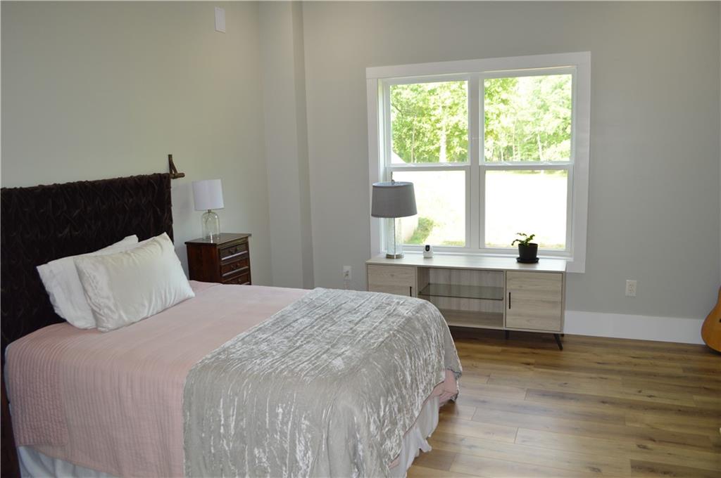 8 Ripplewood Trail Euharlee, GA 30145 - Photo 57 of 90 a bedroom with a bed and a window