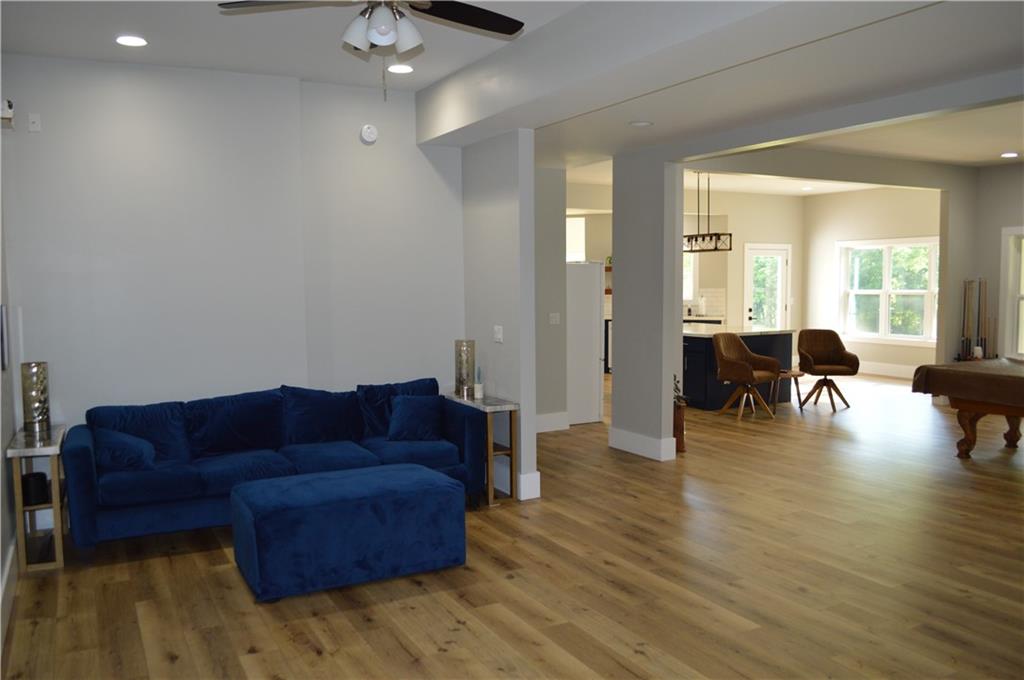 8 Ripplewood Trail Euharlee, GA 30145 - Photo 71 of 90 a living room with furniture and a wooden floor