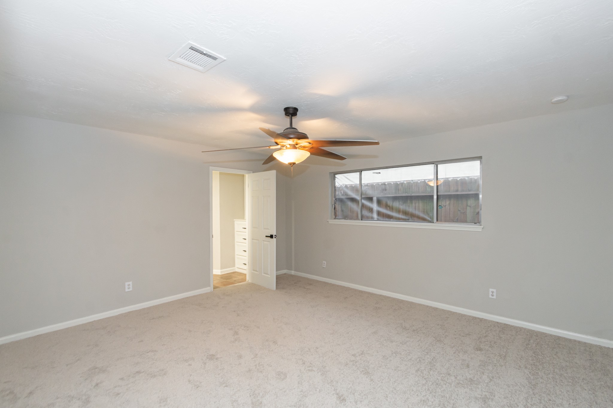 29019 Stapleford Street Spring, TX 77386 - Photo 16 of 29 a view of an empty room with a window
