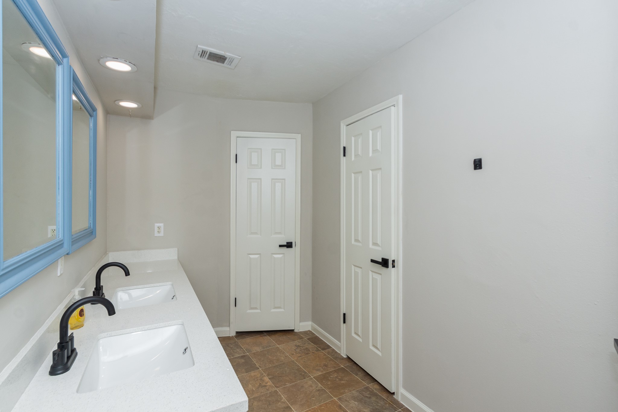 29019 Stapleford Street Spring, TX 77386 - Photo 21 of 29 a bathroom with a sink and a mirror