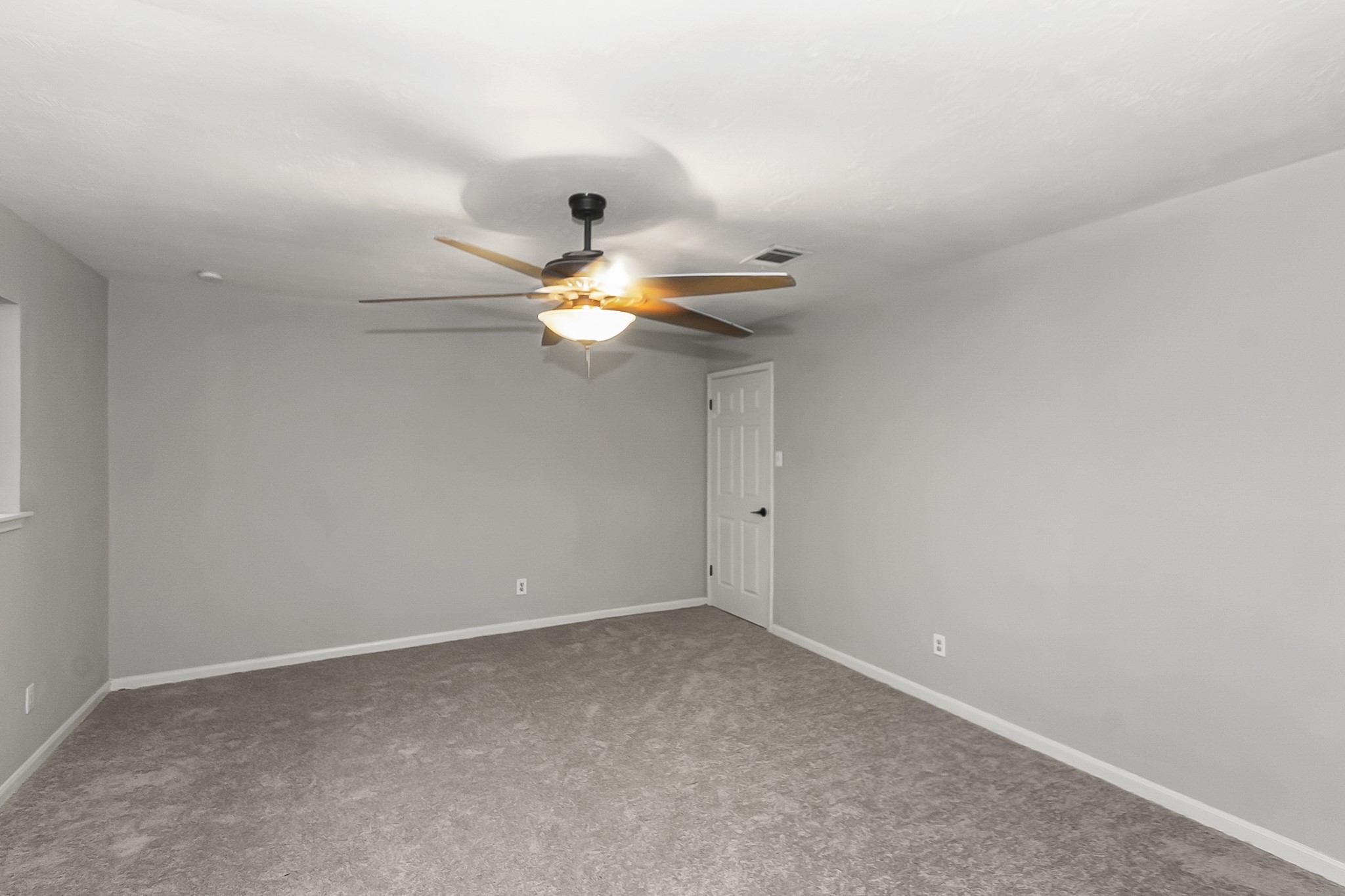 29019 Stapleford Street Spring, TX 77386 - Photo 23 of 29 a view of a livingroom with a chandelier fan