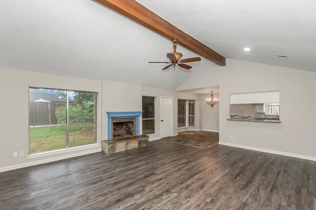 a kitchen with a sink and stainless steel appliances