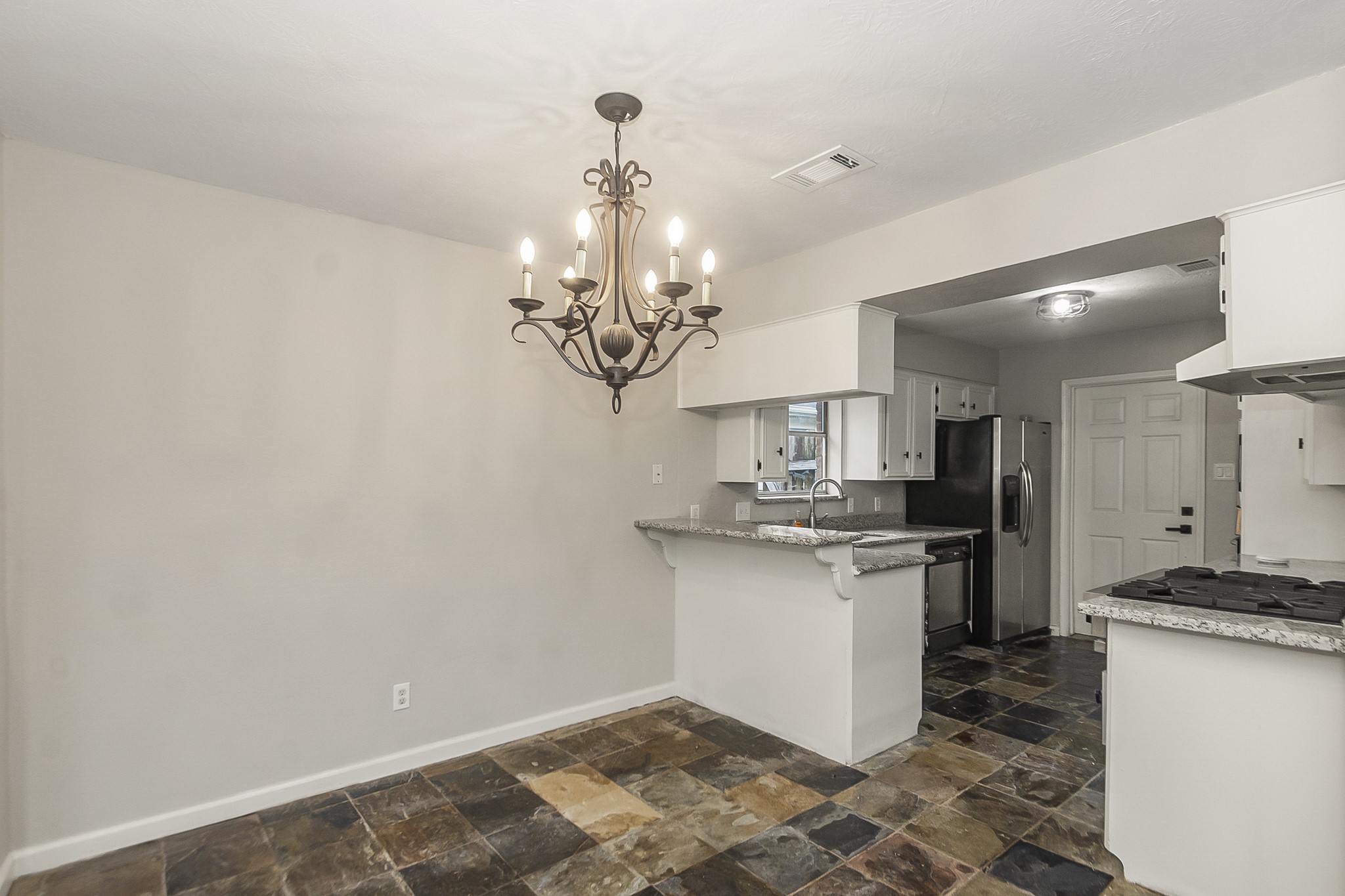 29019 Stapleford Street Spring, TX 77386 - Photo 8 of 29 a kitchen with a sink and stainless steel appliances