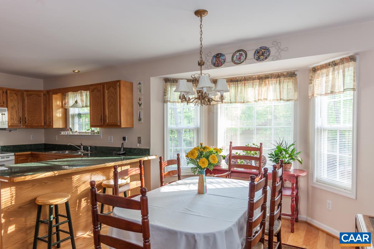 46 Riverside Drive Palmyra, VA 22963 - Photo 8 of 19 a view of a dining room and furniture window and wooden floor