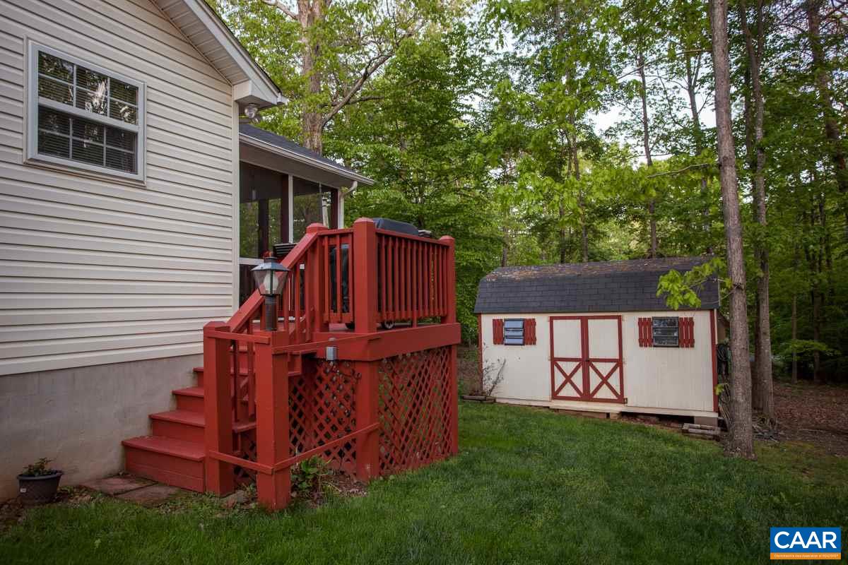 46 Riverside Drive Palmyra, VA 22963 - Photo 10 of 19 a view of backyard with deck and garden