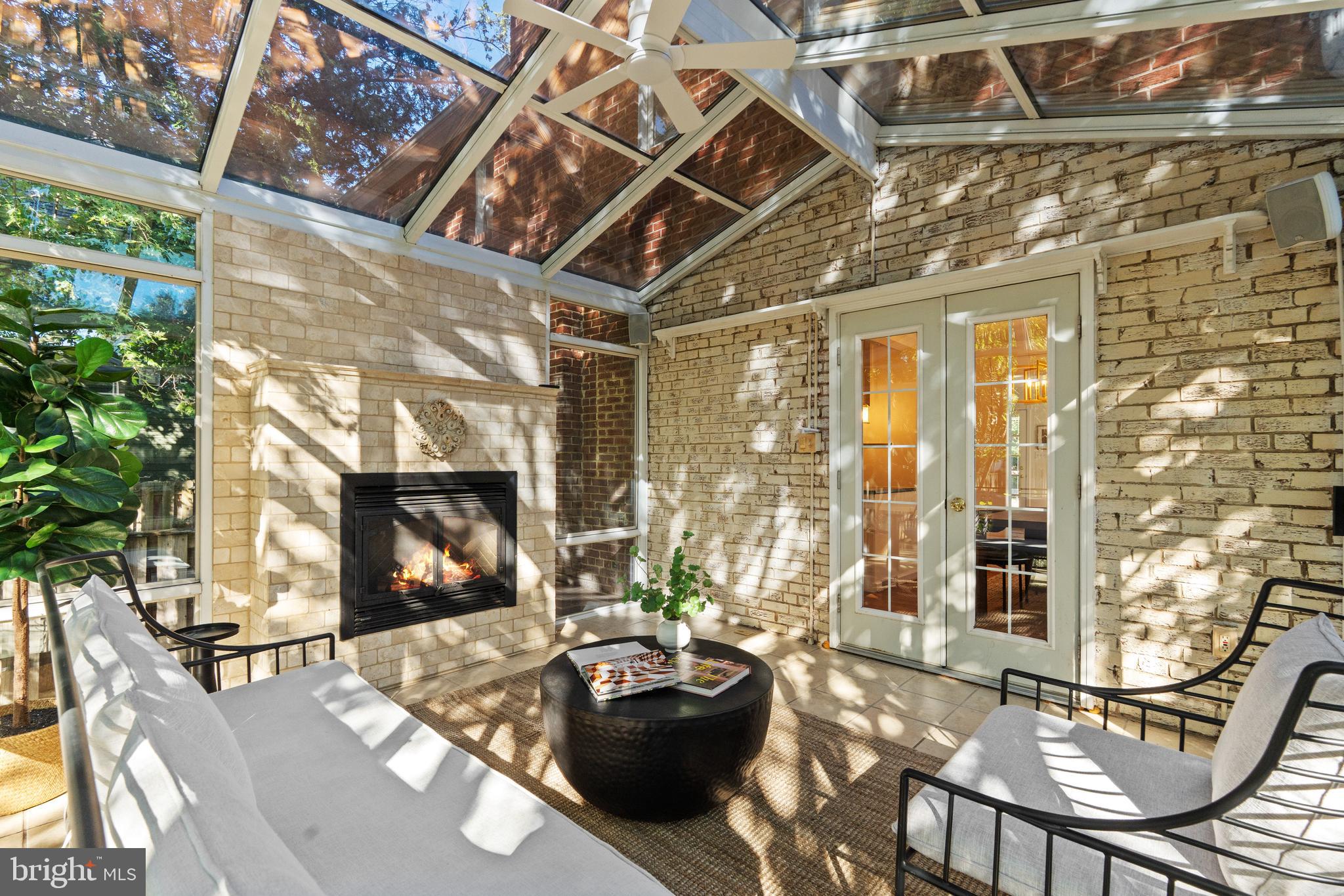 307 East Oxford Avenue, Unit 1/2 Alexandria, VA 22301 - Photo 14 of 34 a living room with furniture and a fireplace