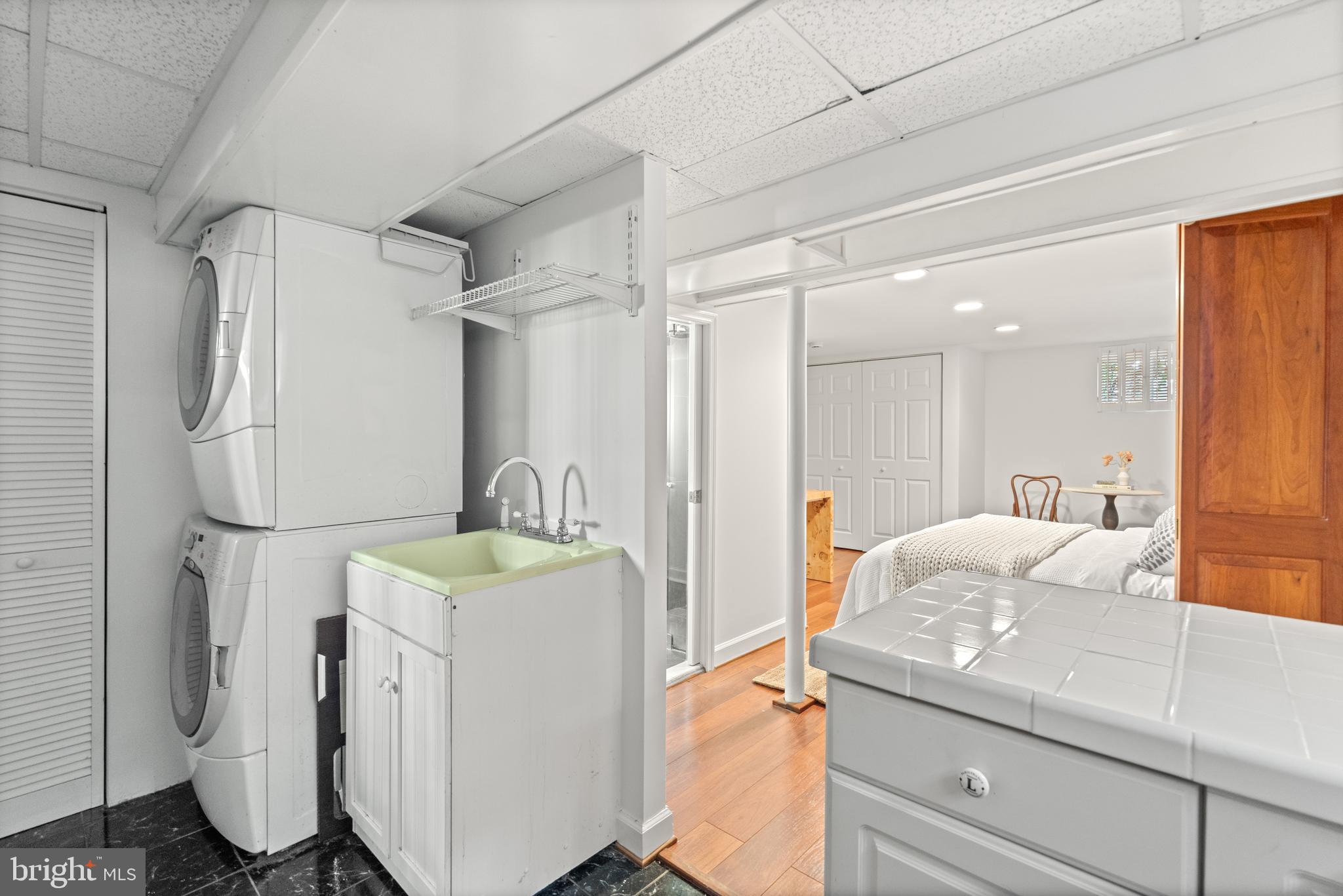 307 East Oxford Avenue, Unit 1/2 Alexandria, VA 22301 - Photo 27 of 34 a bathroom with a sink and a mirror