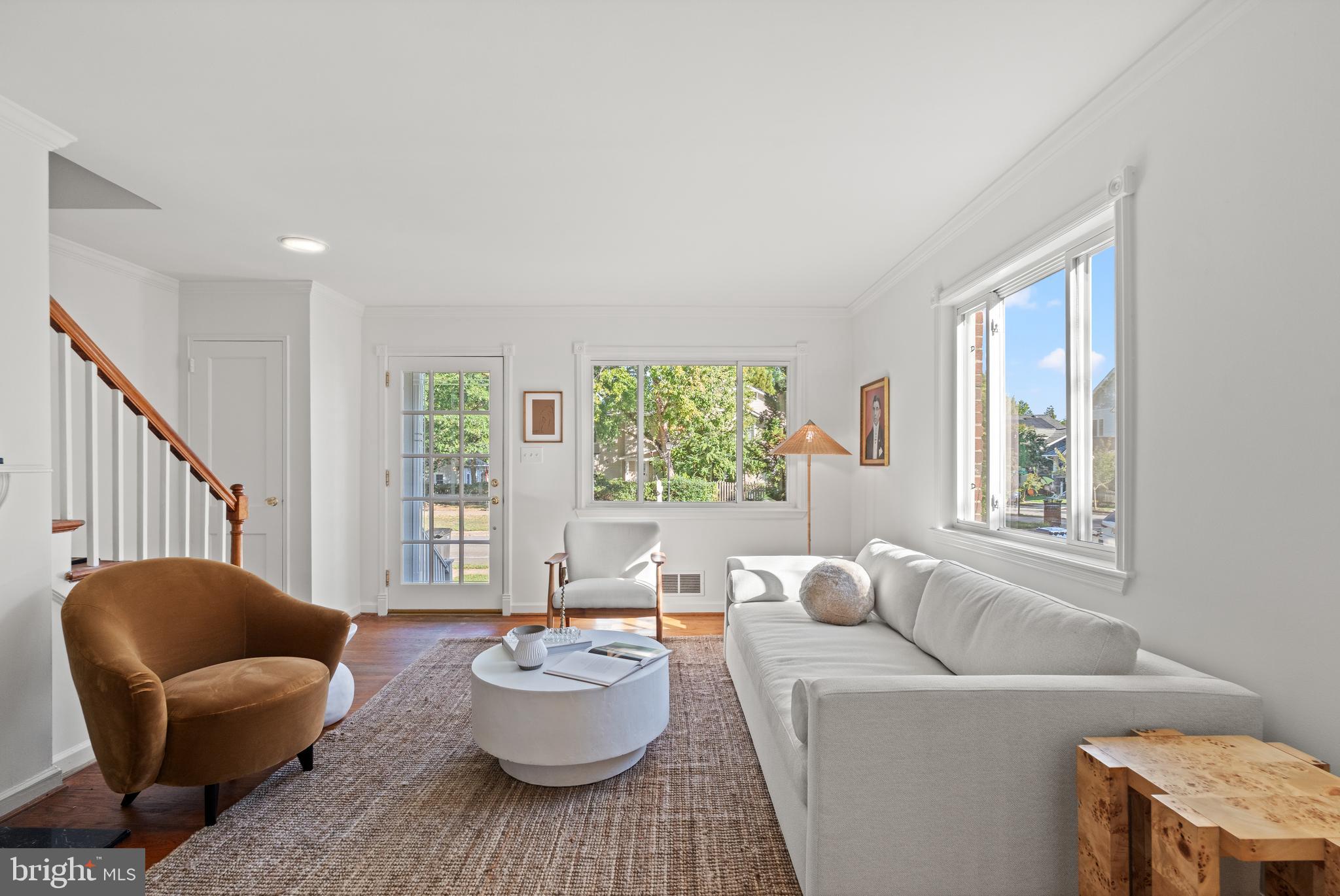 307 East Oxford Avenue, Unit 1/2 Alexandria, VA 22301 - Photo 3 of 34 a living room with furniture and a window
