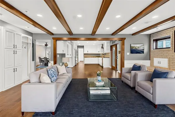 a view of a livingroom with wooden floor