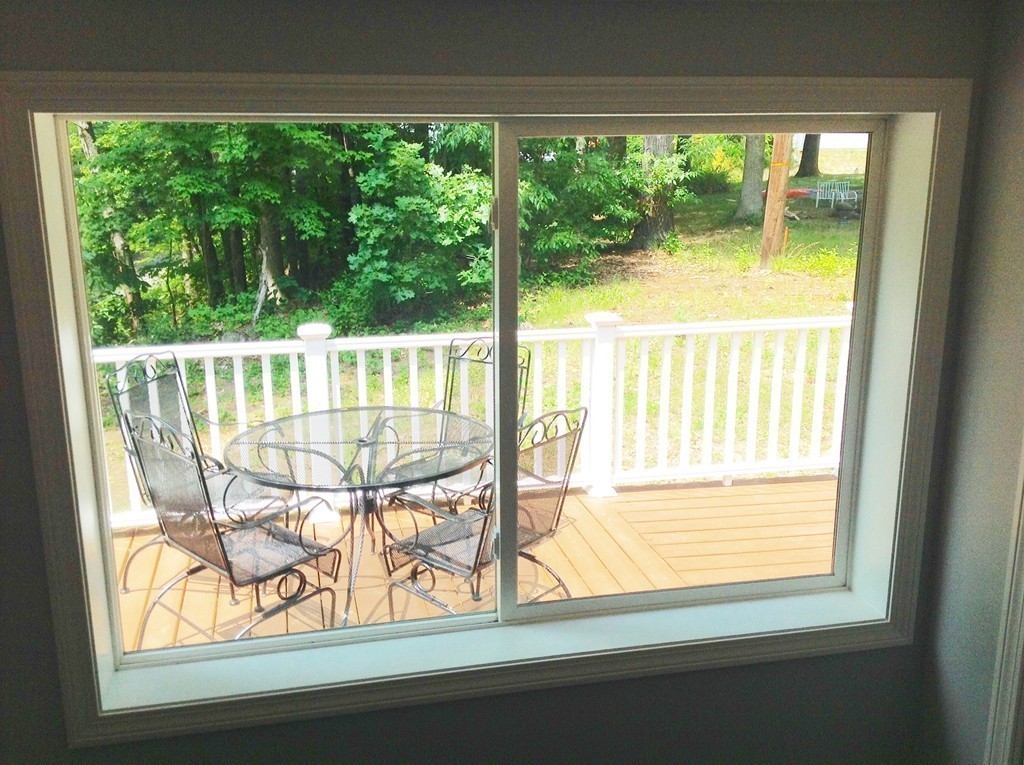 16 Cedar Road Groton, MA 01450 - Photo 19 of 25 a view of a room with wooden floor and windows