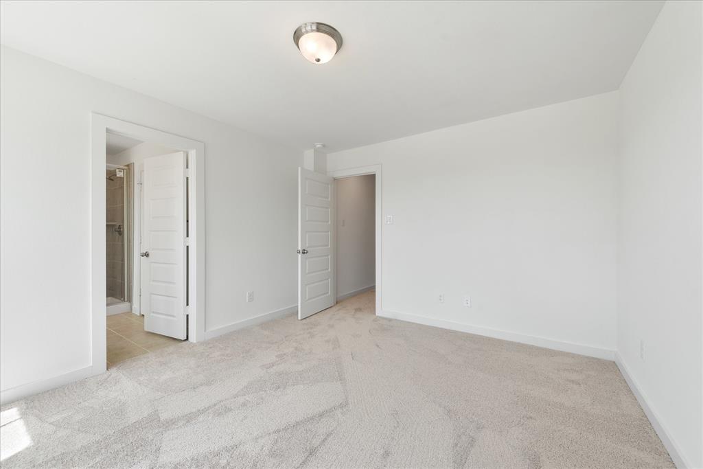 1215 Chestnut Court Runaway Bay, TX 76426 - Photo 20 of 28 an empty room with closet area