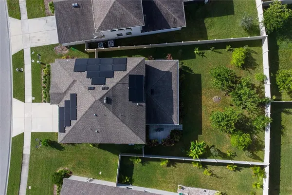 an aerial view of a house having swimming pool