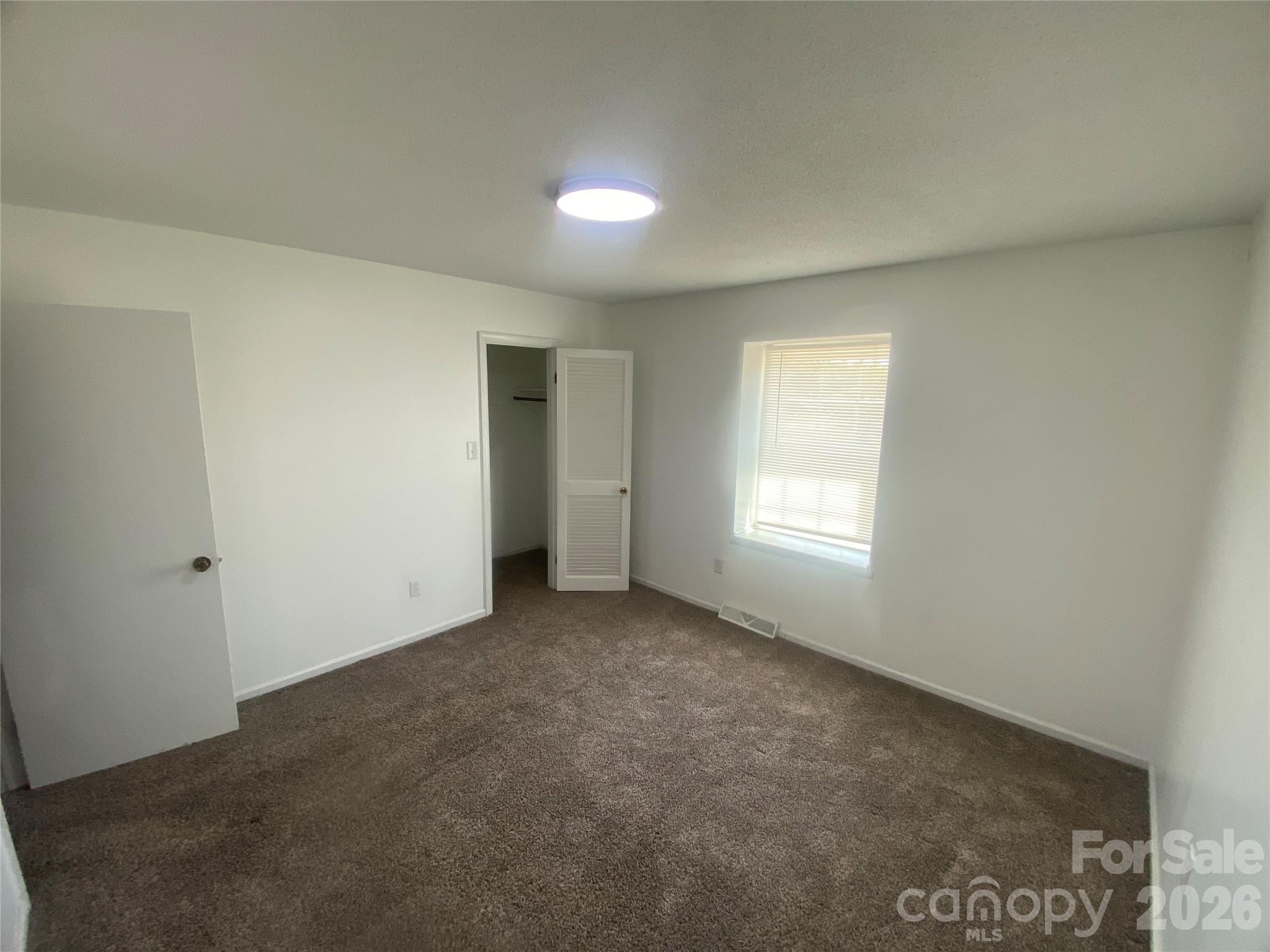 788 Coley Road Salisbury, NC 28146 - Photo 43 of 43 a view of an empty room with a window